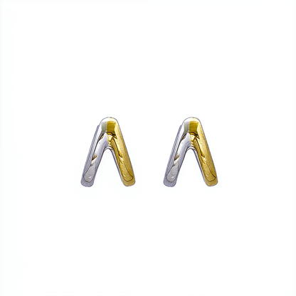 Dual-tone gold and silver huggie earrings with polished modern design