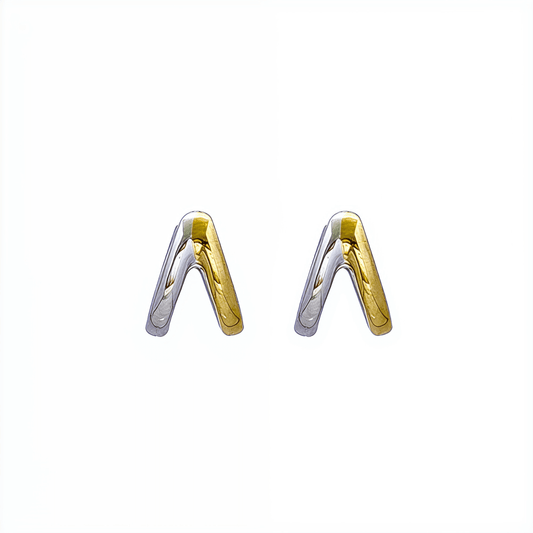 Dual-tone gold and silver huggie earrings with polished modern design
