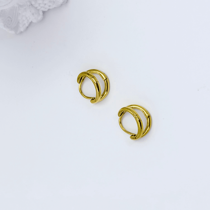 Double gold huggie earrings with layered hoop design
