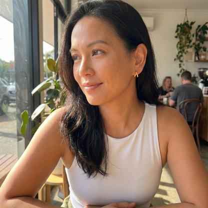 Double gold huggie earrings with layered hoop design