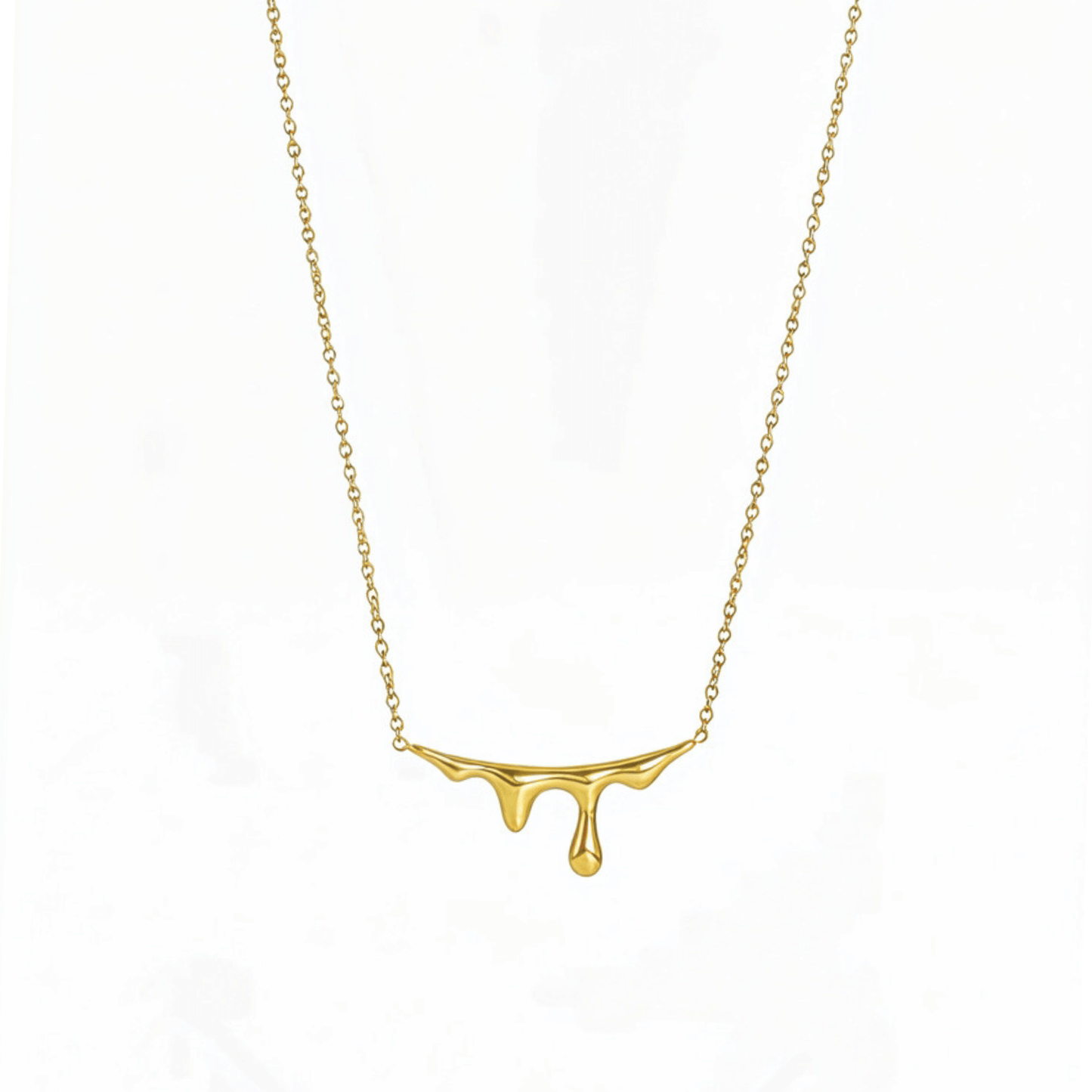 Gold drip-style pendant necklace with a sleek molten design on a fine chain,