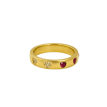 Gold waterproof ring with alternating pink and clear heart-shaped stones.