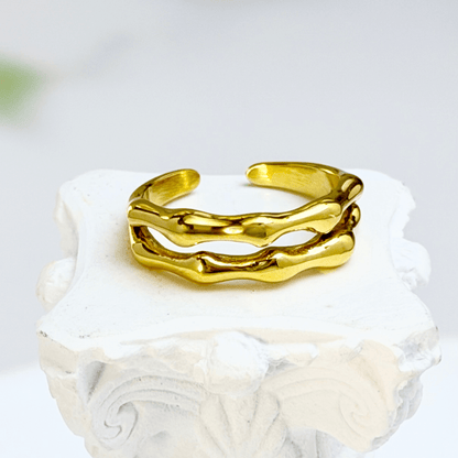 Dual Wave Gold Ring – sculptural wave-inspired gold band.