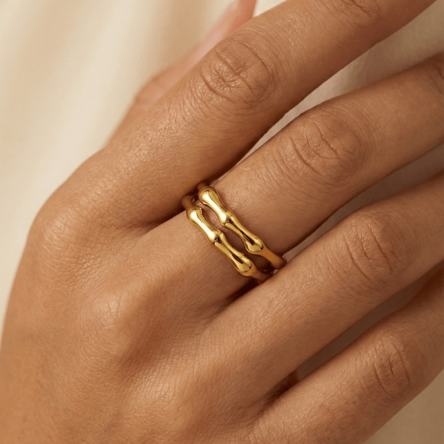 Dual Wave Gold Ring – sculptural wave-inspired gold band.