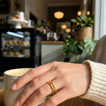 Dual Wave Gold Ring – sculptural wave-inspired gold band.