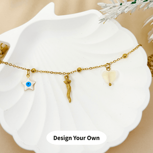 DYO (Design Your Own) gold charm bracelet featuring a delicate thin linked chain – minimalist and lightweight, perfect for layering or everyday wear. Waterproof, tarnish-free, and hypoallergenic. 