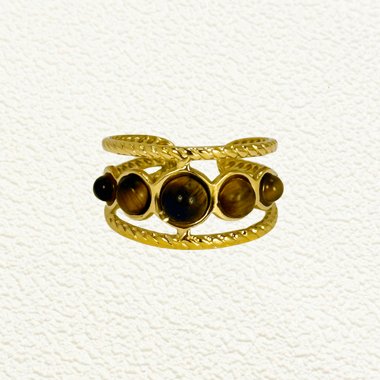Ember Stone Band Ring with textured gold double band and five natural stones in warm earthy tones. Waterproof, tarnish-resistant, and adjustable statement ring.