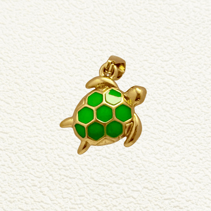 Small gold turtle charm with bright green hexagon-patterned enamel shell, lightweight and playful, perfect for ocean-themed jewelry designs