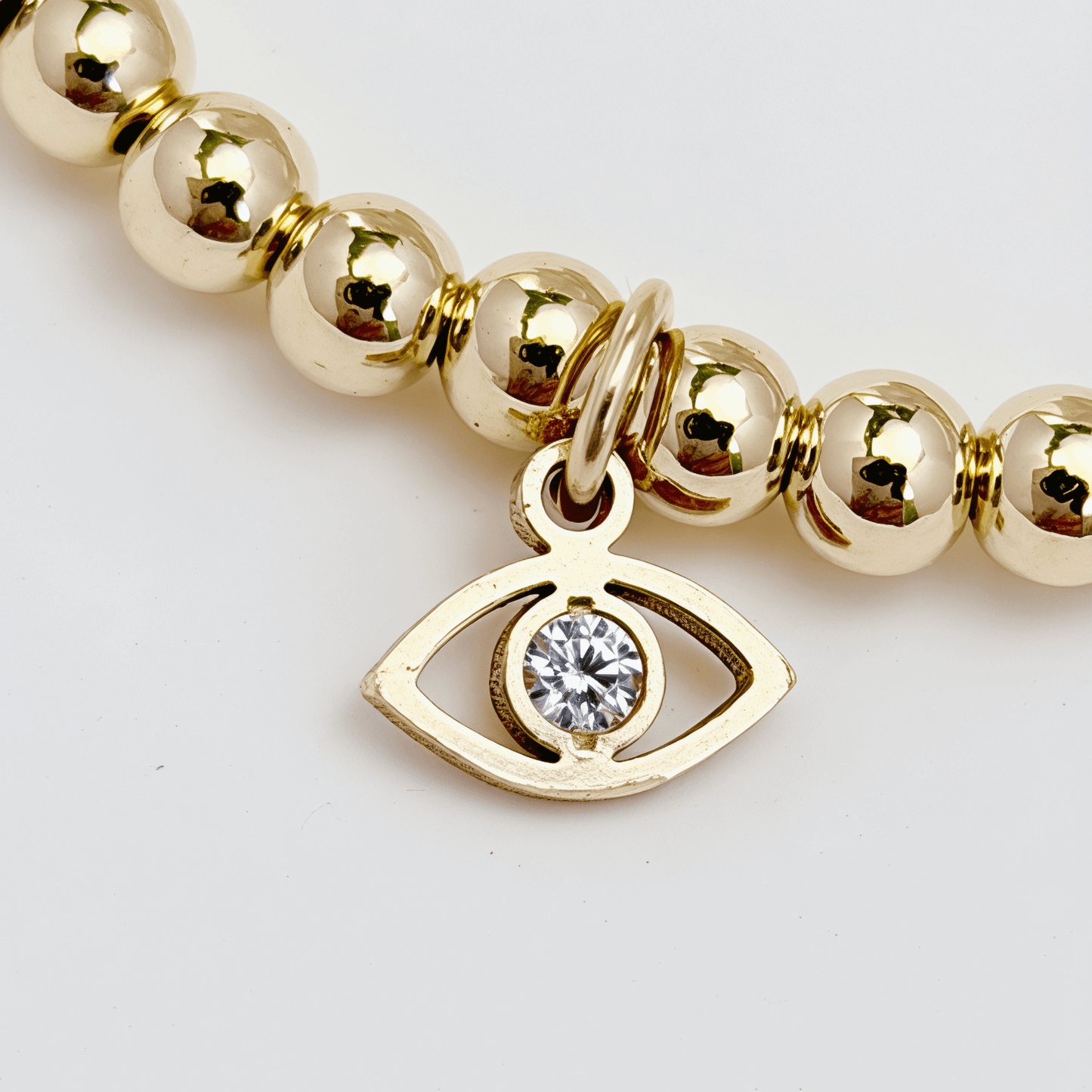 Waterproof evil eye charm gold filled bead bracelet with crystal detail – MXW Jewellery