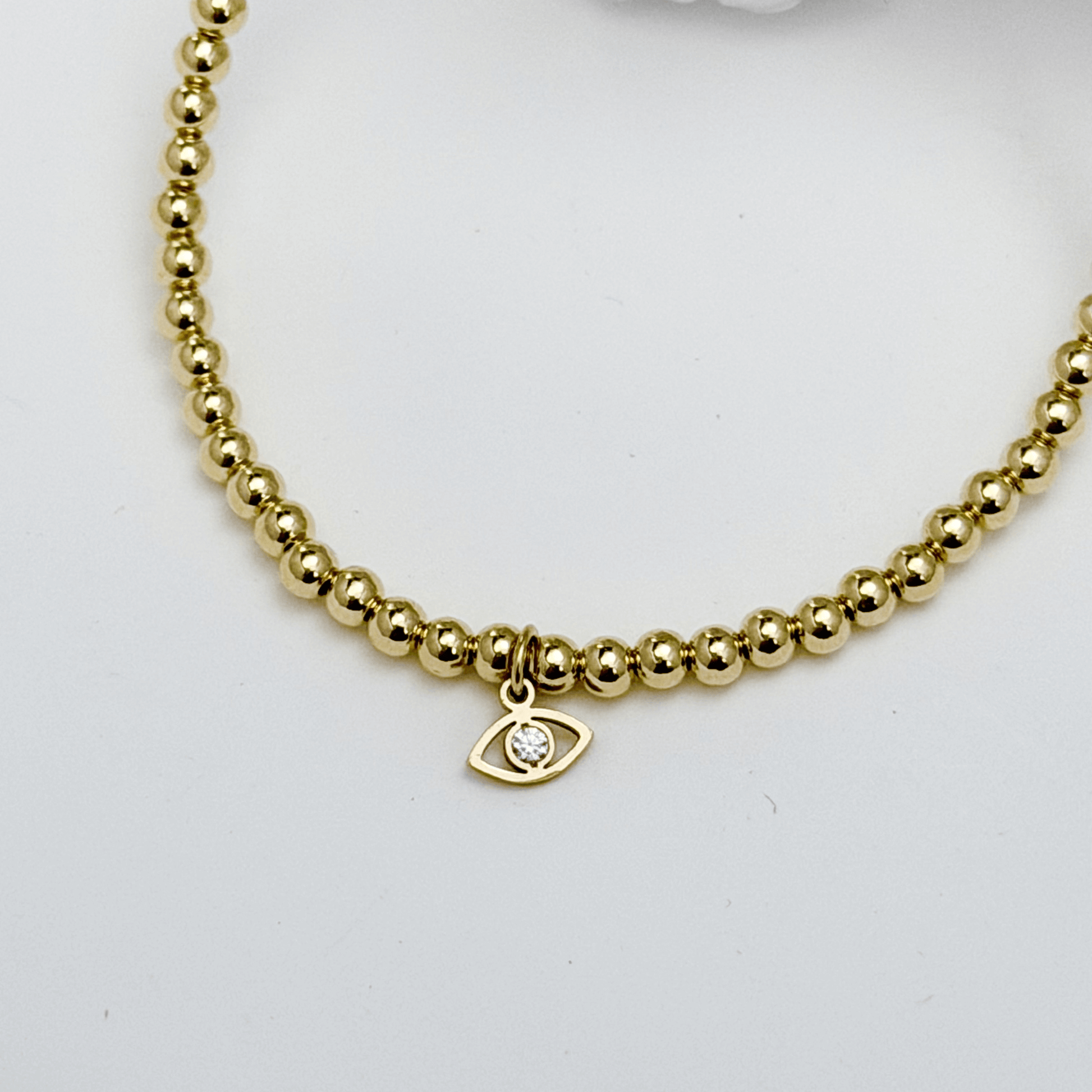 Waterproof evil eye charm gold filled bead bracelet with crystal detail – MXW Jewellery