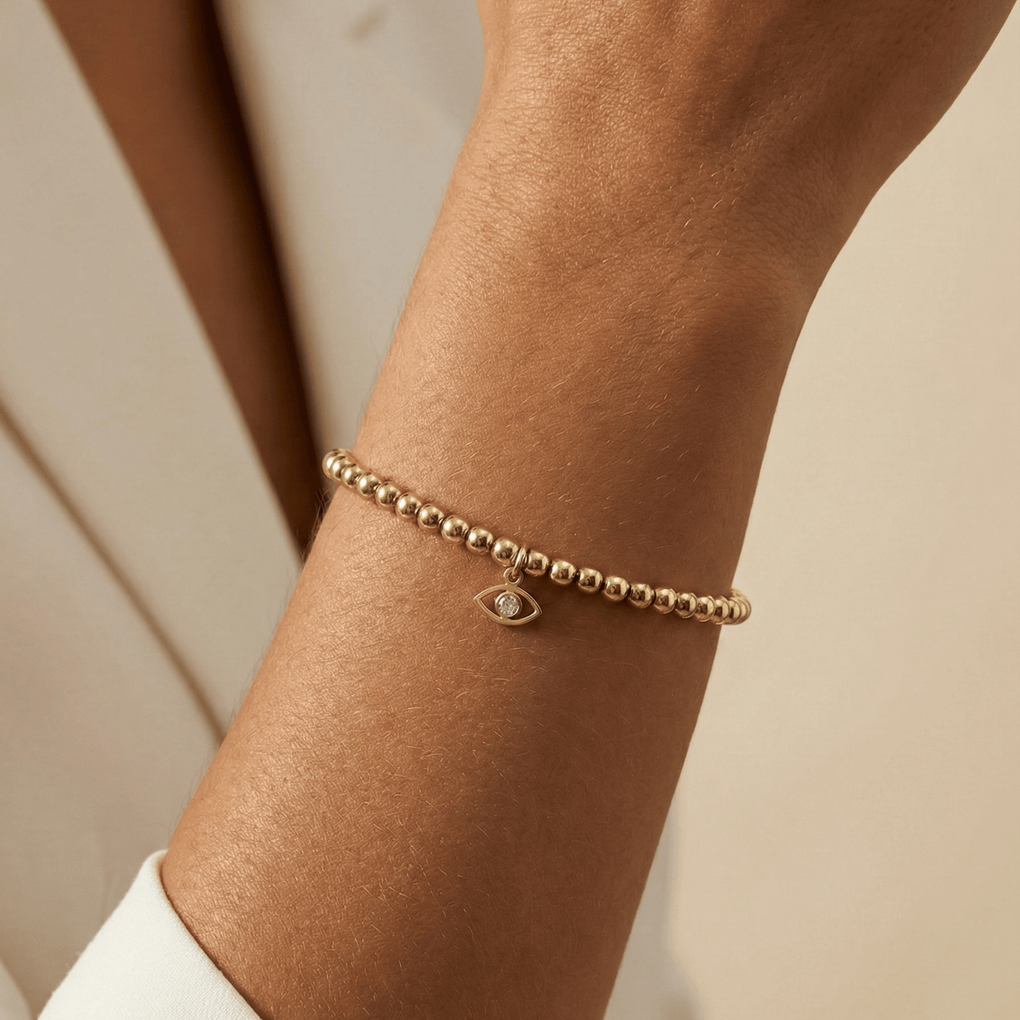Waterproof evil eye charm gold filled bead bracelet with crystal detail – MXW Jewellery