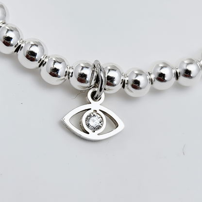 Evil eye charm sterling silver bead bracelet with crystal detail and polished silver beads – MXW Jewellery