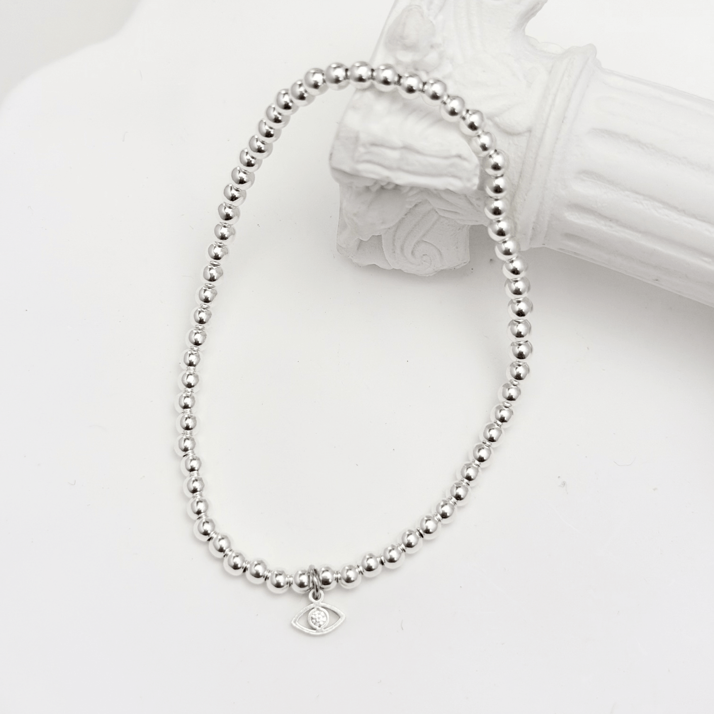Evil eye charm sterling silver bead bracelet with crystal detail and polished silver beads – MXW Jewellery
