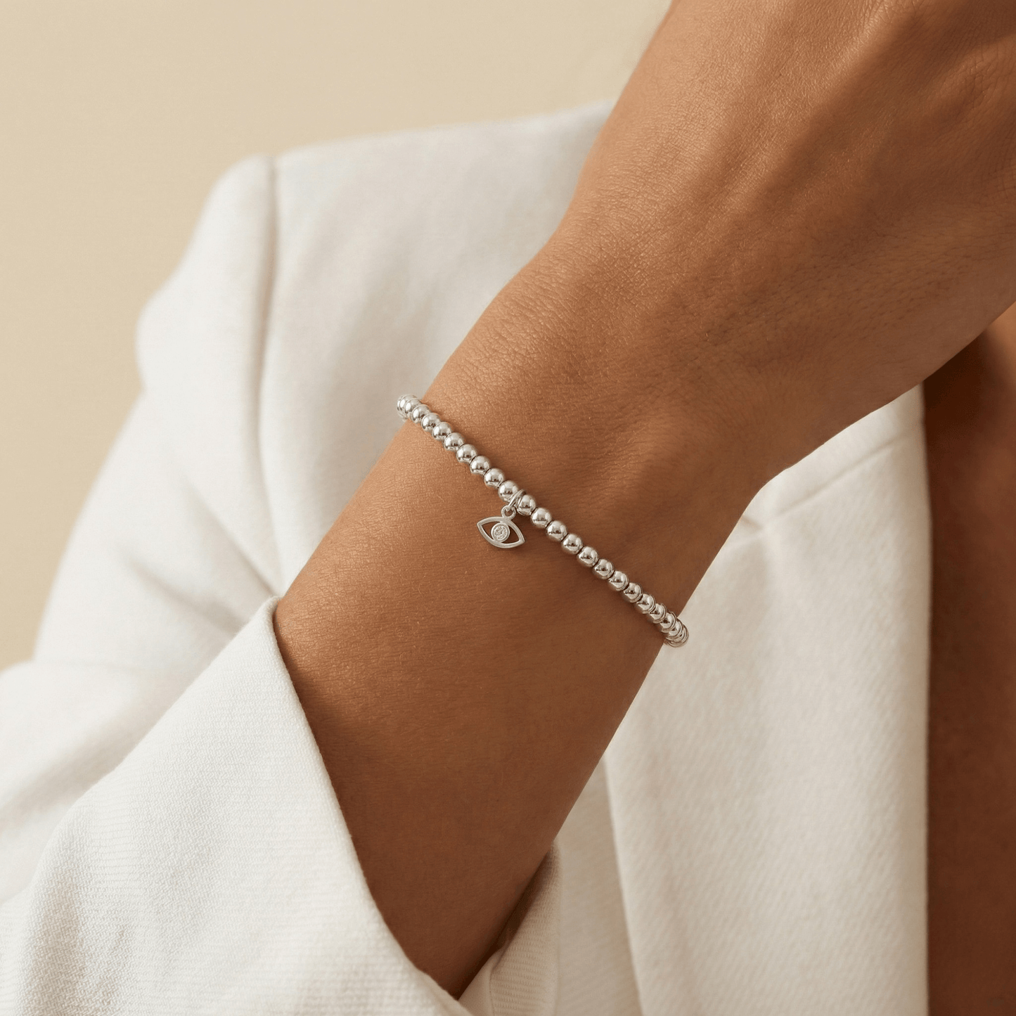 Evil eye charm sterling silver bead bracelet with crystal detail and polished silver beads – MXW Jewellery