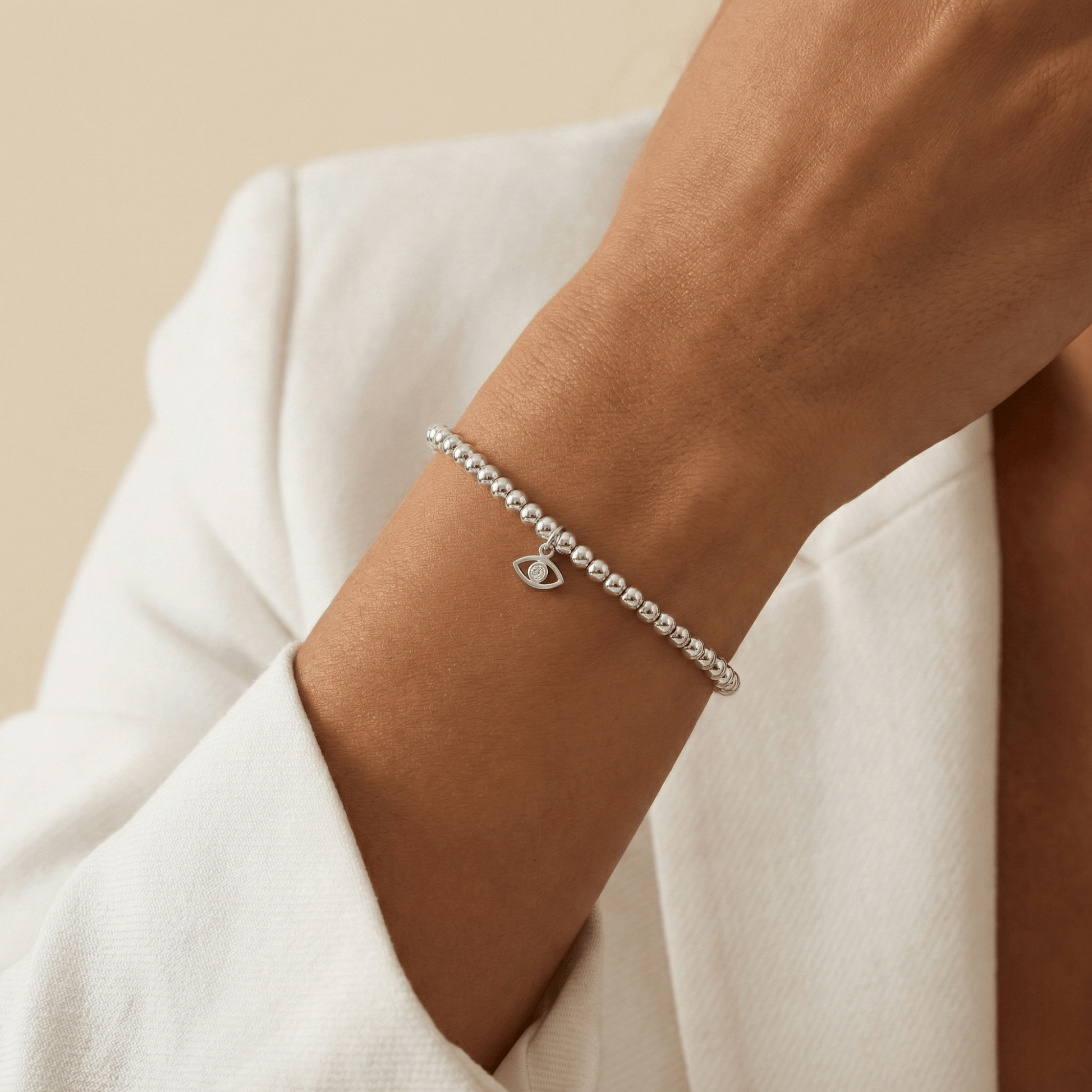 Evil eye charm sterling silver bead bracelet with crystal detail and polished silver beads – MXW Jewellery