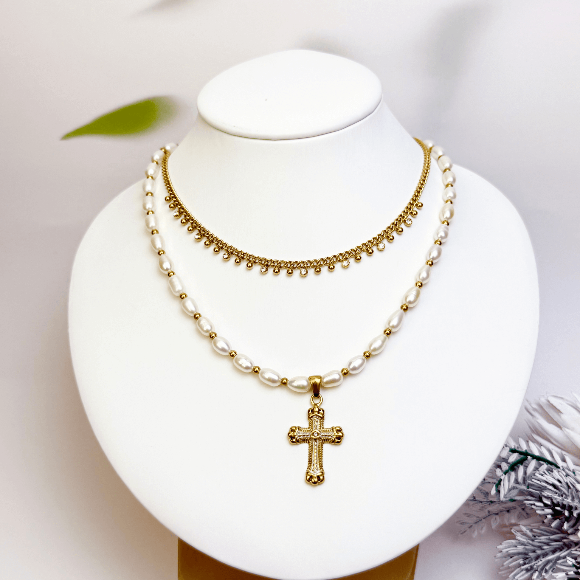 Layered pearl cross necklace set with freshwater pearls and gold zircon chain