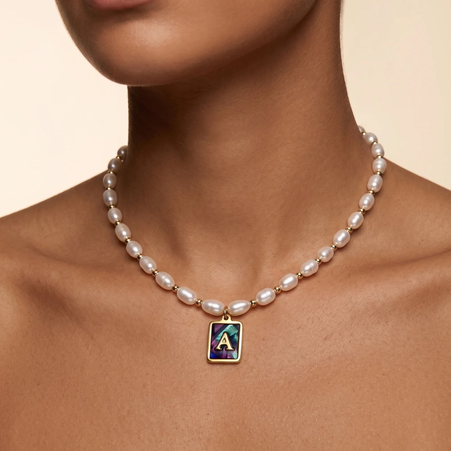 Premium freshwater rice pearl and 14K gold filled beaded necklace with personalised abalone shell initial charm, hand-finished in Australia