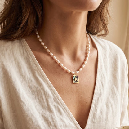 Premium freshwater rice pearl and 14K gold filled beaded necklace with personalised abalone shell initial charm, hand-finished in Australia