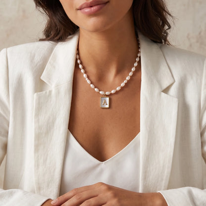Premium freshwater rice pearl and 14K gold filled beaded necklace with personalised blue mother of shell initial charm, hand-finished in Australia