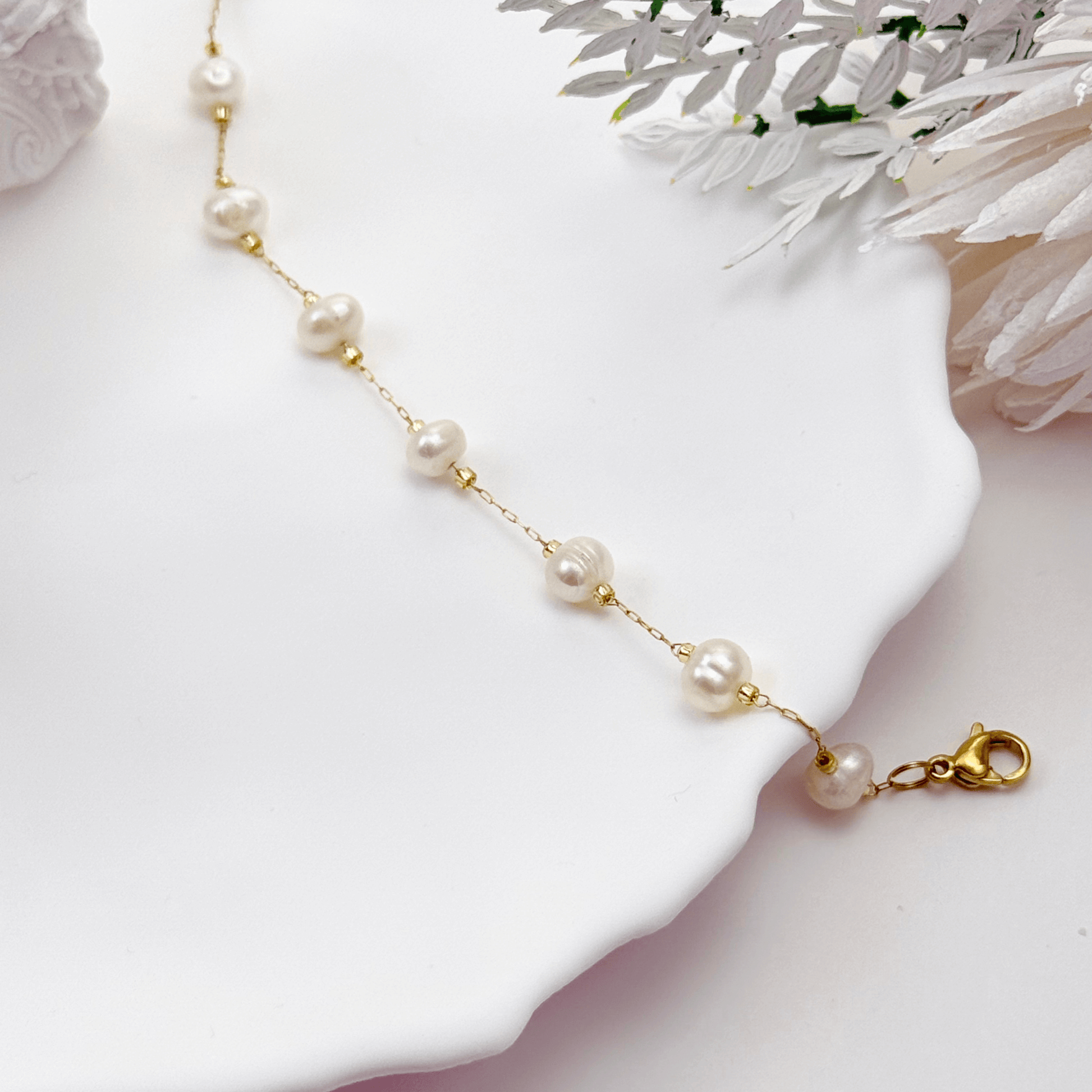 Elegant freshwater pearl necklace on a dainty gold chain, a timeless jewellery piece perfect for bridesmaids, weddings, or meaningful everyday wear.