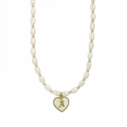 Premium freshwater rice pearl and 14K gold filled beaded necklace with personalised heart shaped mother of shell initial charm, hand-finished in Australia