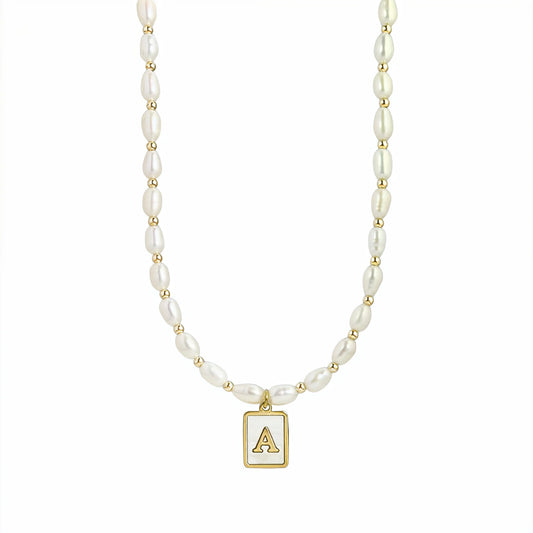 Premium freshwater rice pearl and 14K gold filled beaded necklace with personalised mother of shell initial charm, hand-finished in Australia