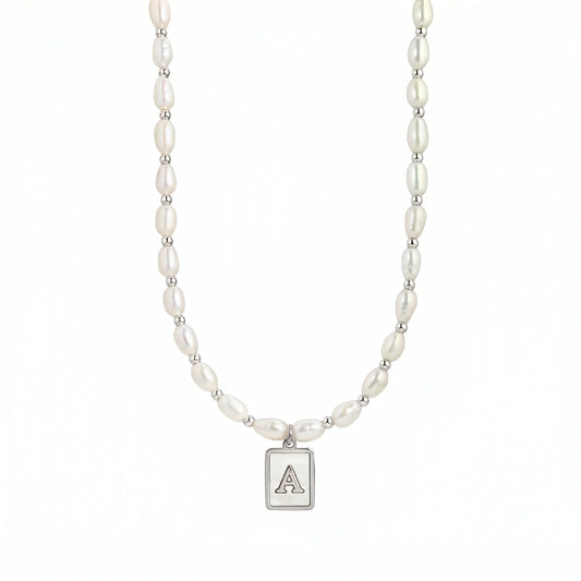 Premium freshwater rice pearl and 925 sterling silver beaded necklace with personalised mother of shell initial charm, hand-finished in Australia