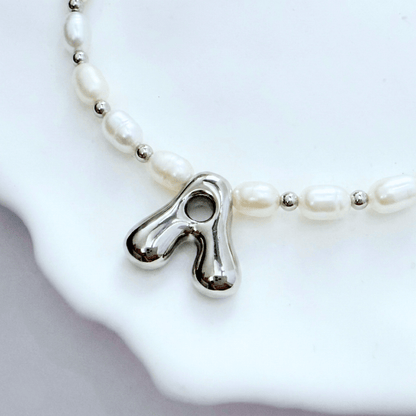 Premium freshwater rice pearl and 925 sterling silver beaded necklace with personalised bubble initial charm, hand-finished in Australia
