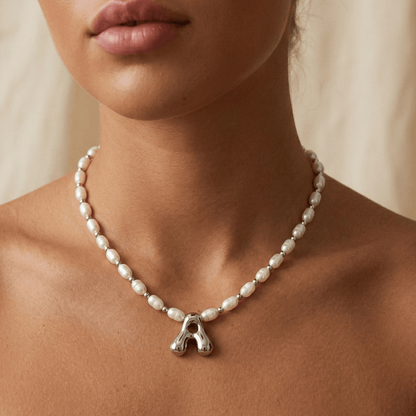 Premium freshwater rice pearl and 925 sterling silver beaded necklace with personalised bubble initial charm, hand-finished in Australia