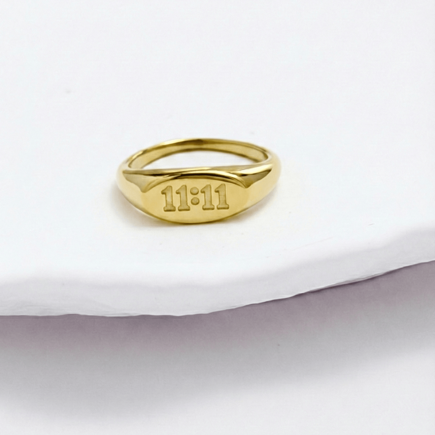 Gold 11:11 Signet Ring with oval face embossed with angel numbers by MXW Jewellery