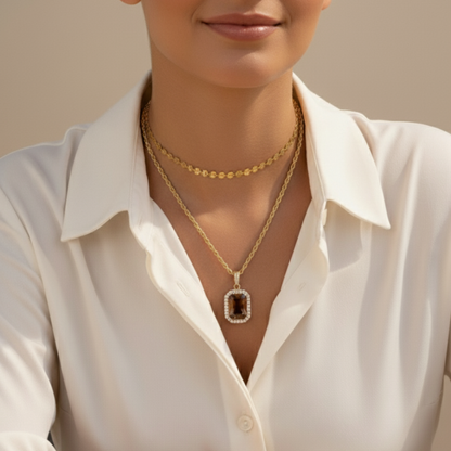 Gold Amber Halo Necklace featuring a rectangular amber zircon surrounded by halo crystals on a gold rope chain.