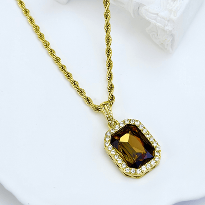 Gold Amber Halo Necklace featuring a rectangular amber zircon surrounded by halo crystals on a gold rope chain.