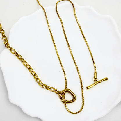gold asymmetric T-bar lariat necklace with mixed chain design
