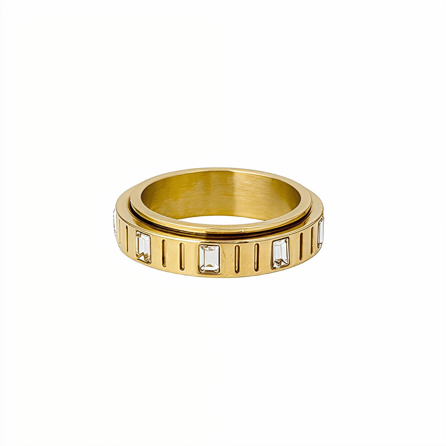 Gold Baguette Spinner Ring by MXW Jewellery featuring a rotating band set with clear rectangular crystals.