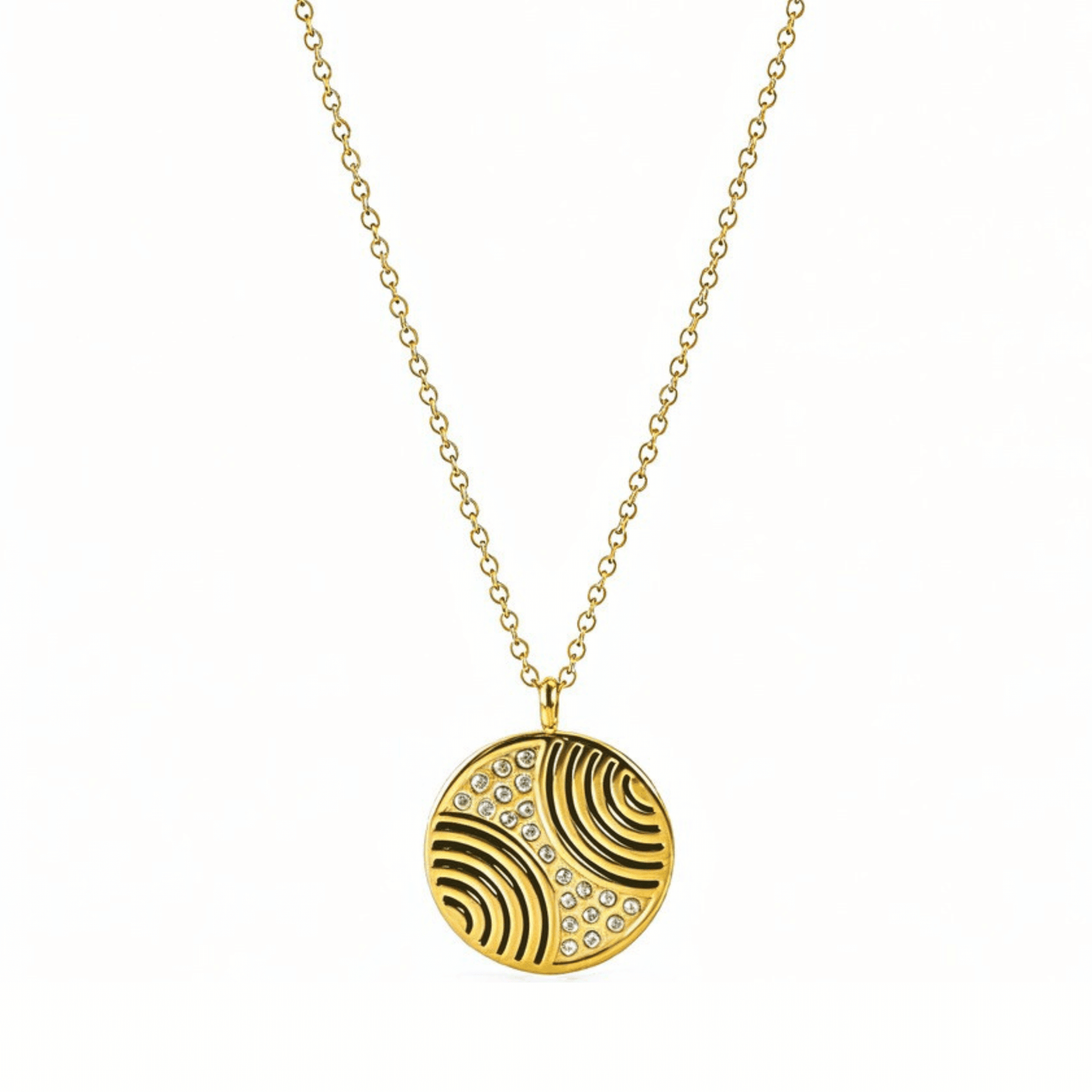 Gold round pendant necklace with engraved flowing pattern and crystal detailing, symbolising harmony and balance.