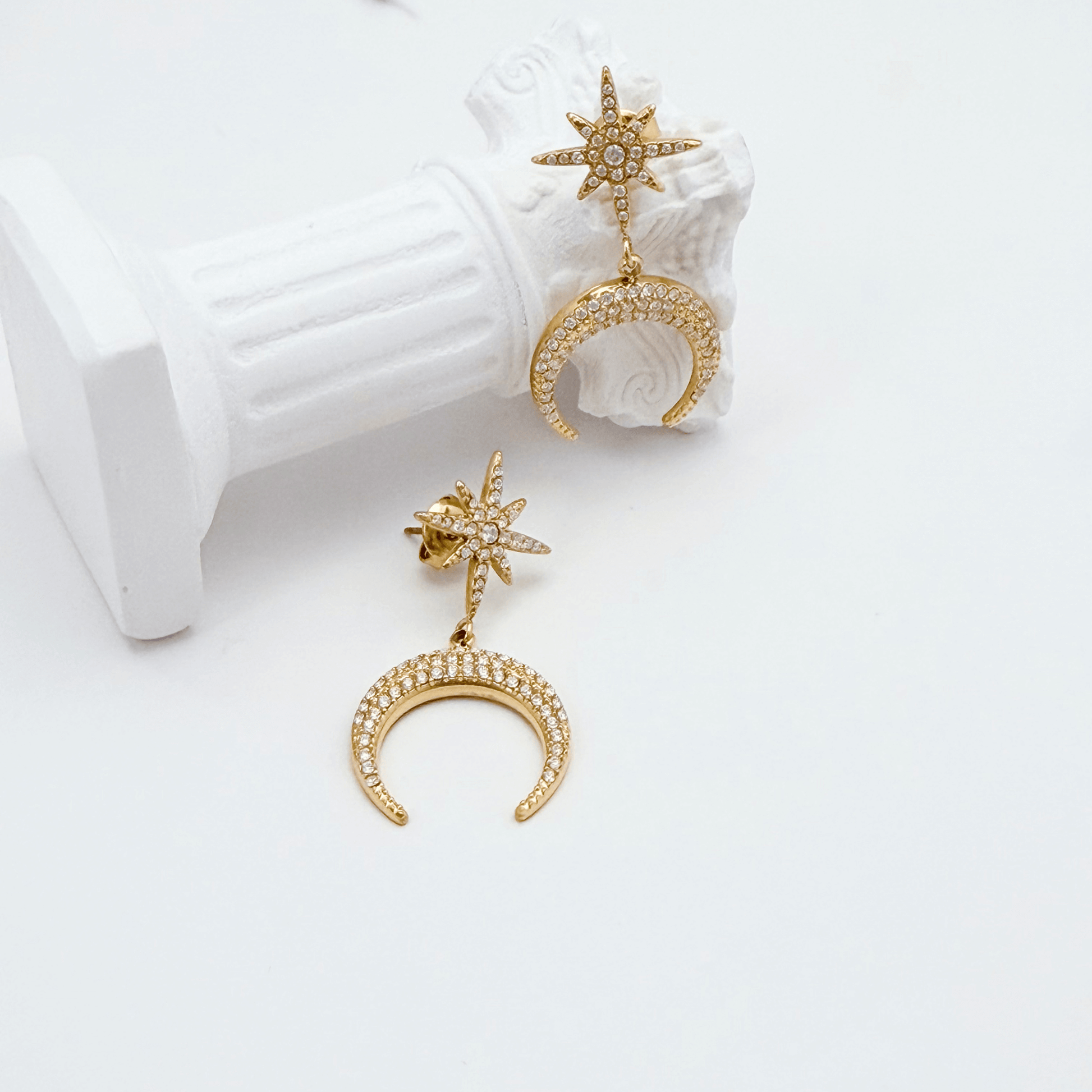 Gold celestial moon and star drop earrings with sparkling pave crystals by MXW Jewellery Australia