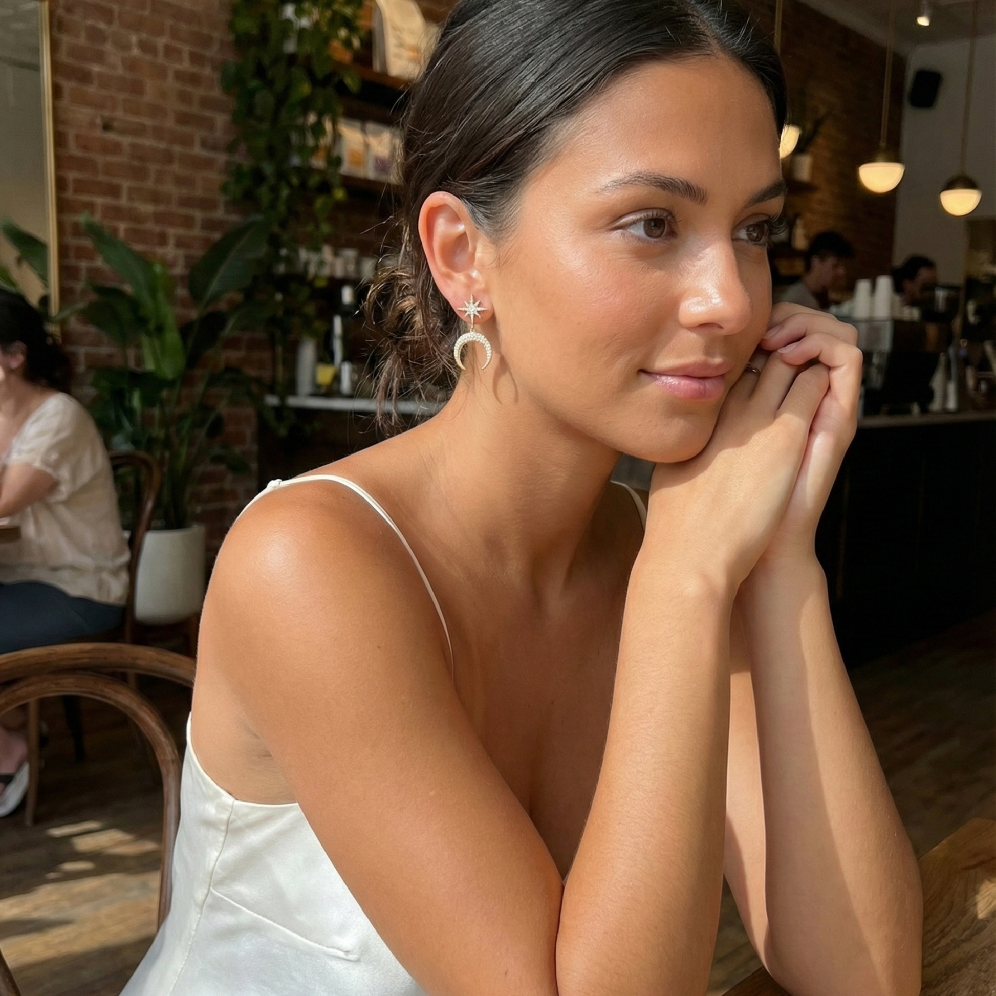 Gold celestial moon and star drop earrings with sparkling pave crystals by MXW Jewellery Australia