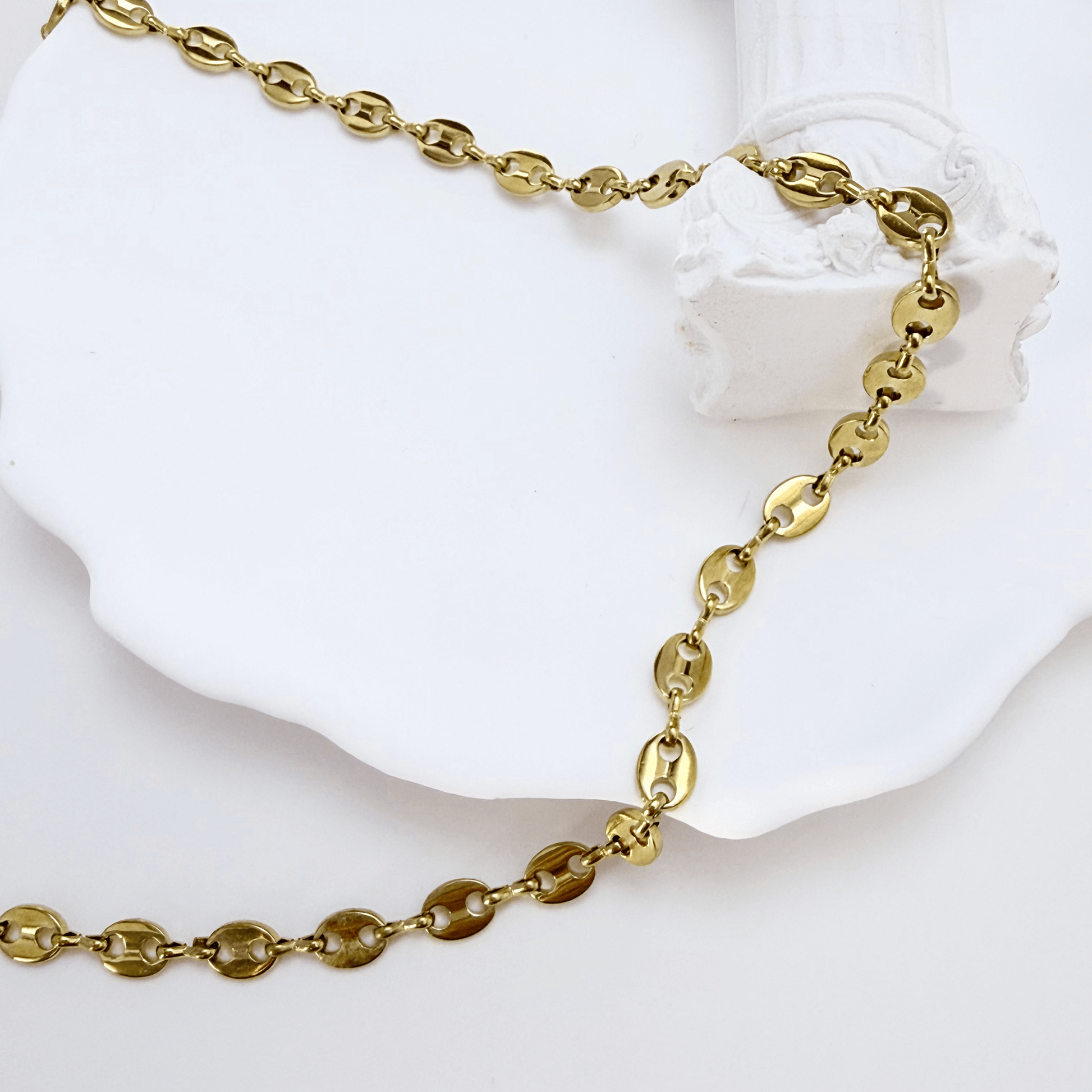 gold coffee bean chain necklace with oval interlocking links, minimal waterproof design for layering or everyday wear