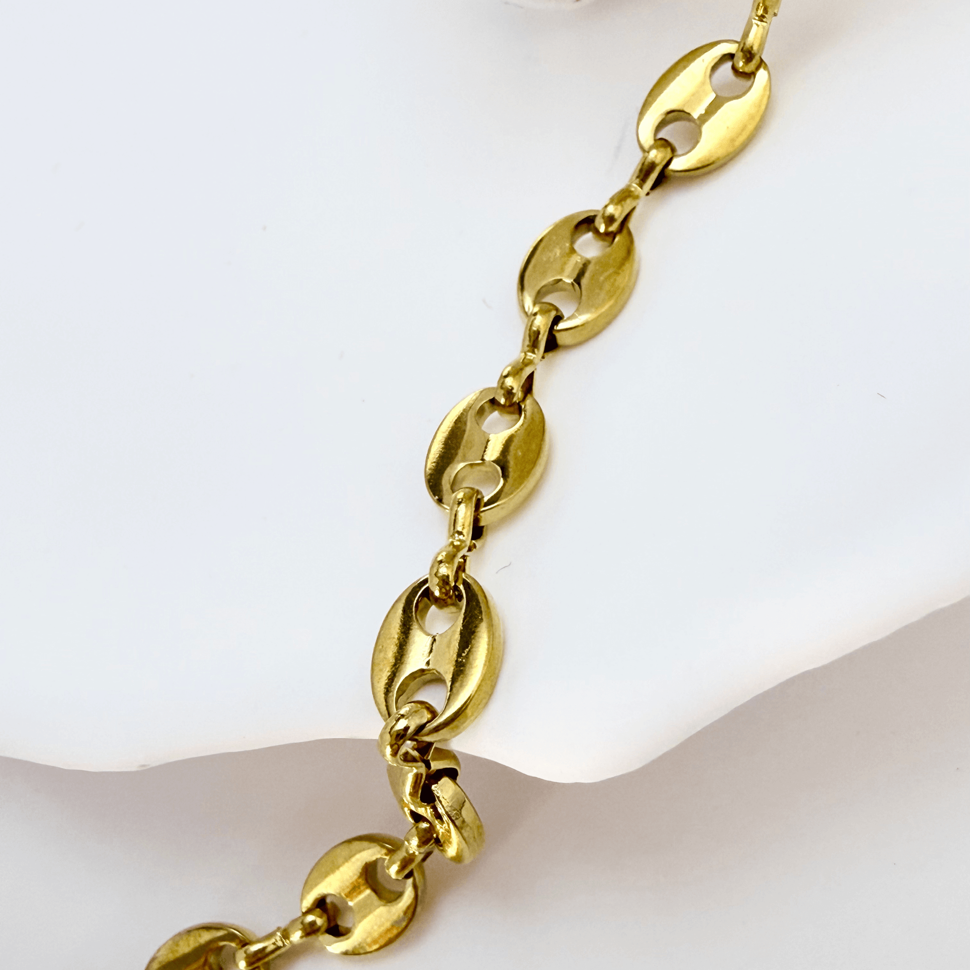 gold coffee bean chain necklace with oval interlocking links, minimal waterproof design for layering or everyday wear