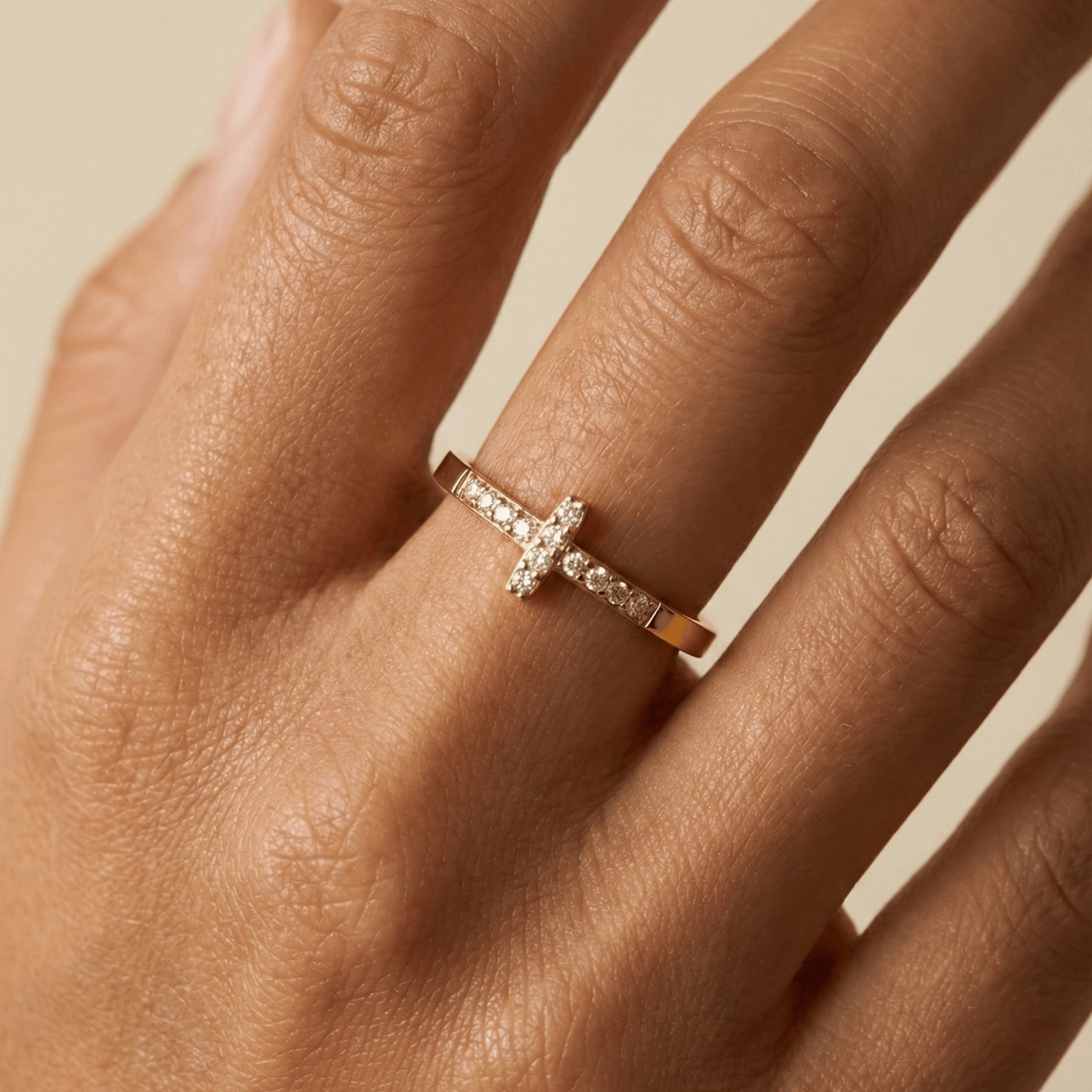 Gold Crystal Cross Ring by MXW Jewellery, featuring a waterproof gold band with a pave-set cross design on a white background.