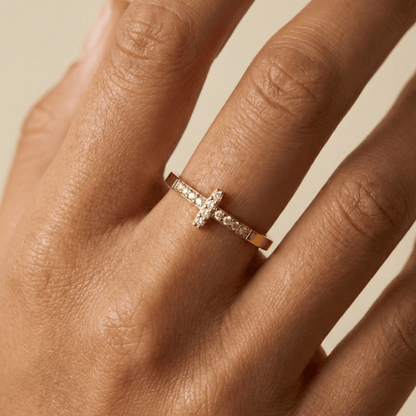 Gold Crystal Cross Ring by MXW Jewellery, featuring a waterproof gold band with a pave-set cross design on a white background.