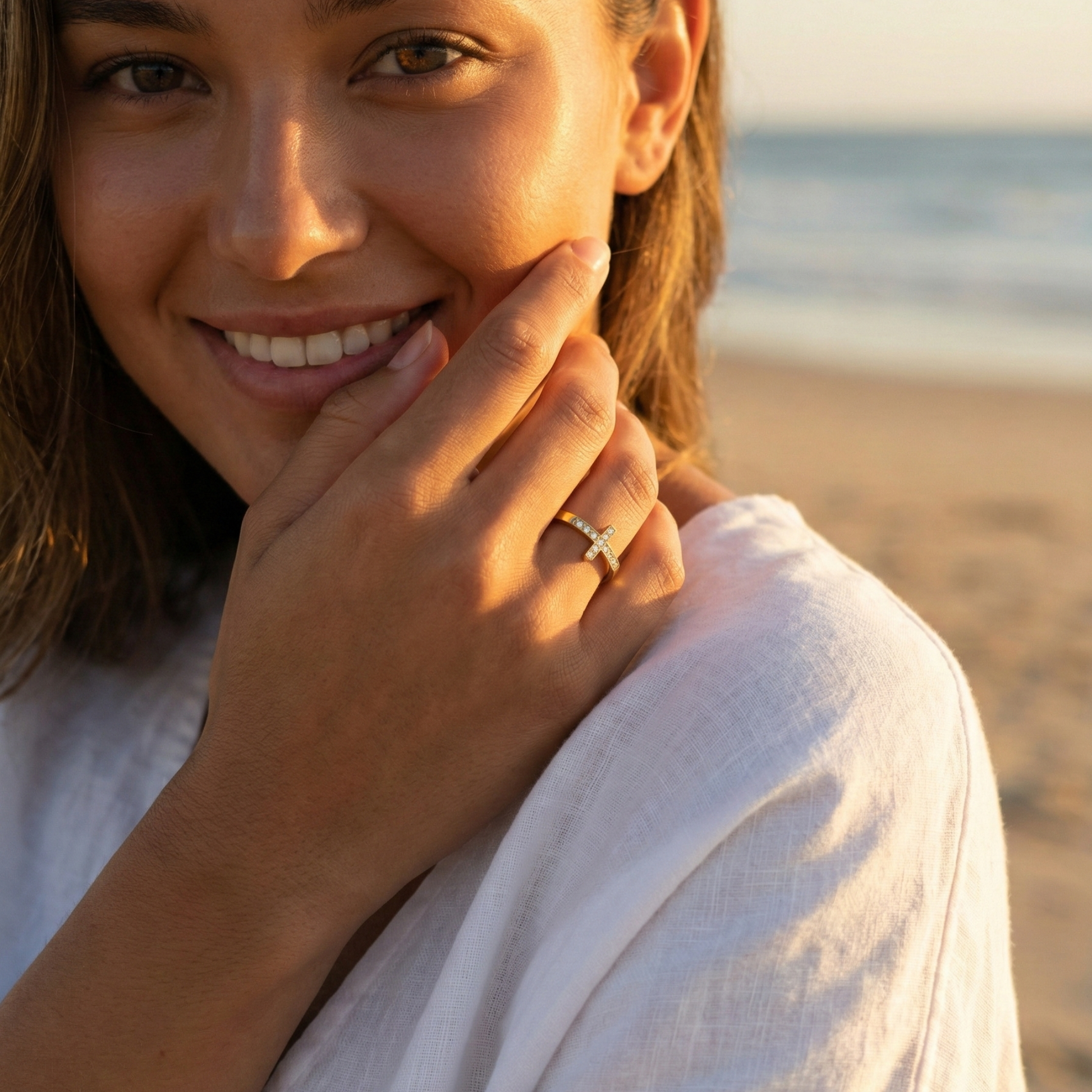 Gold Crystal Cross Ring by MXW Jewellery, featuring a waterproof gold band with a pave-set cross design on a white background.