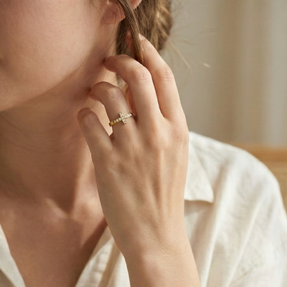 Gold Crystal Cross Ring by MXW Jewellery, featuring a waterproof gold band with a pave-set cross design on a white background.