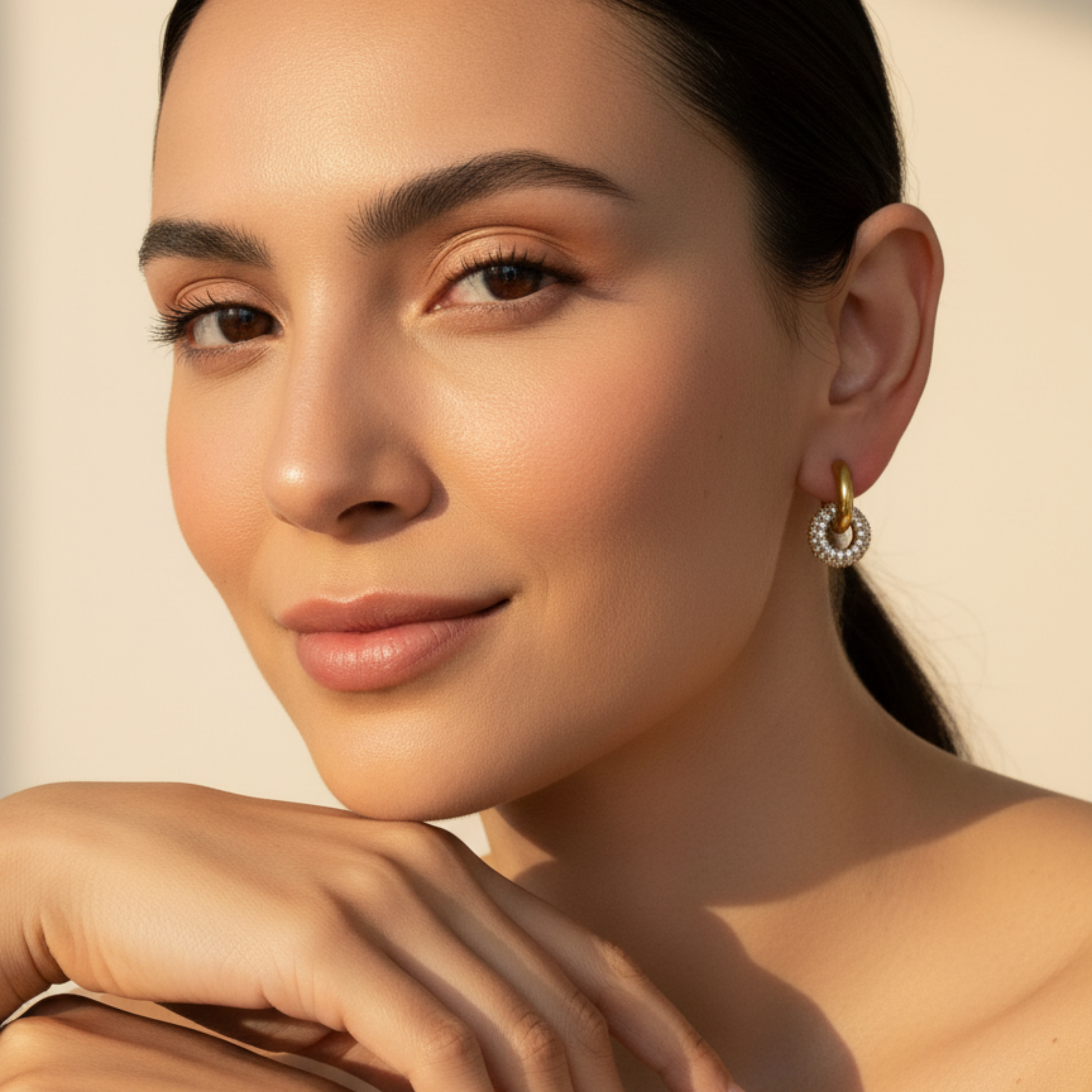 Gold crystal halo drop earrings with pavé circle and gold huggie hoop, waterproof and tarnish-resistant design.