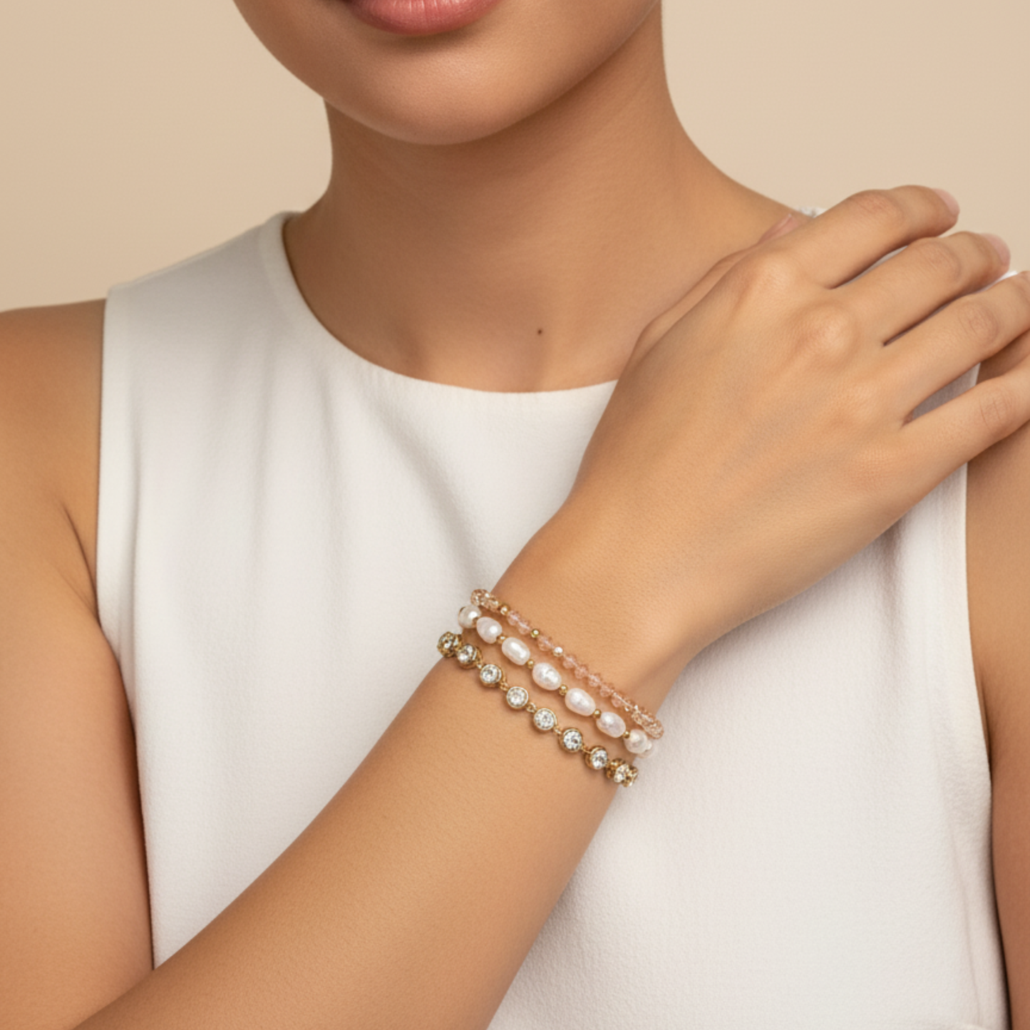 Gold crystal tennis bracelet with bezel-set clear stones.