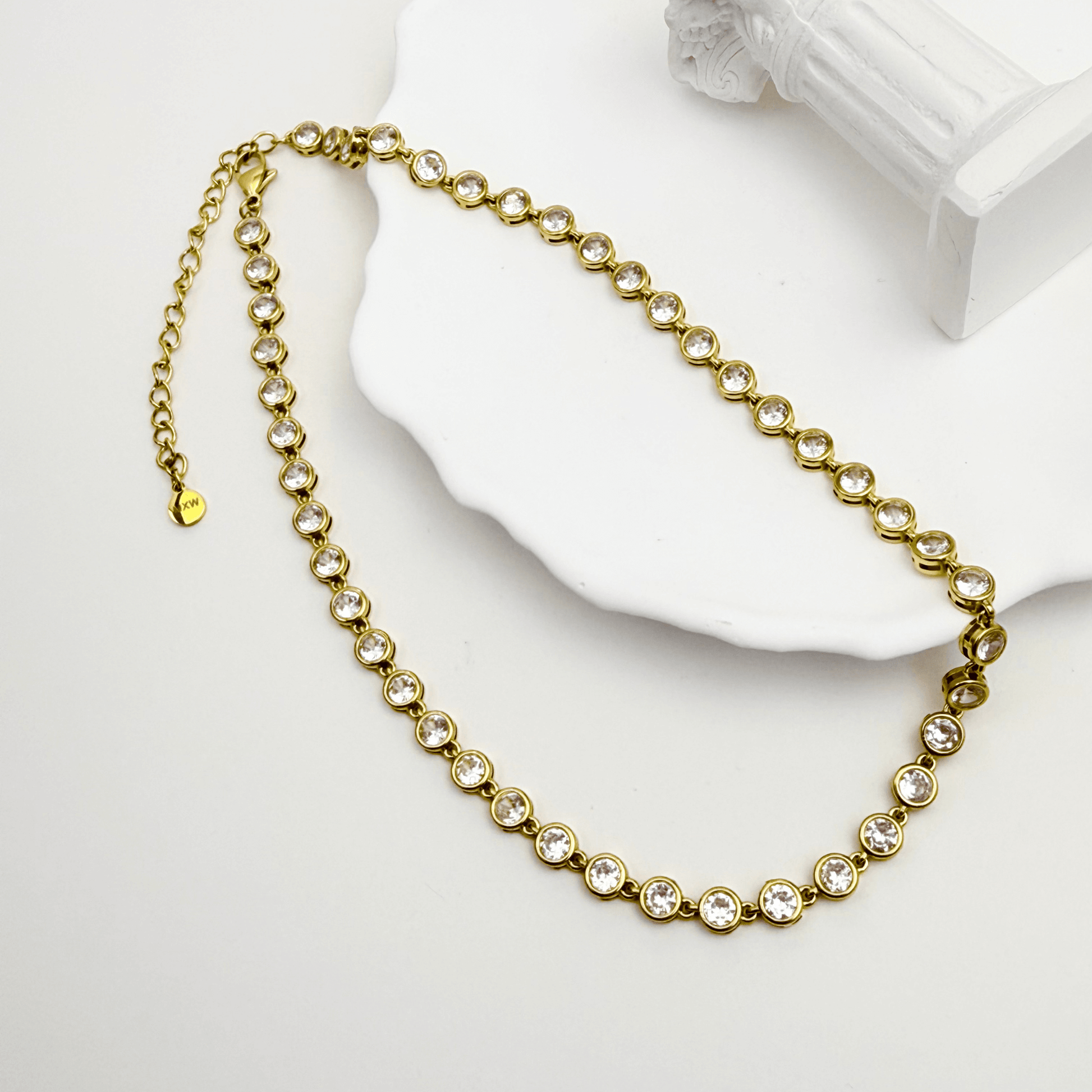 gold crystal tennis necklace with bezel-set stones