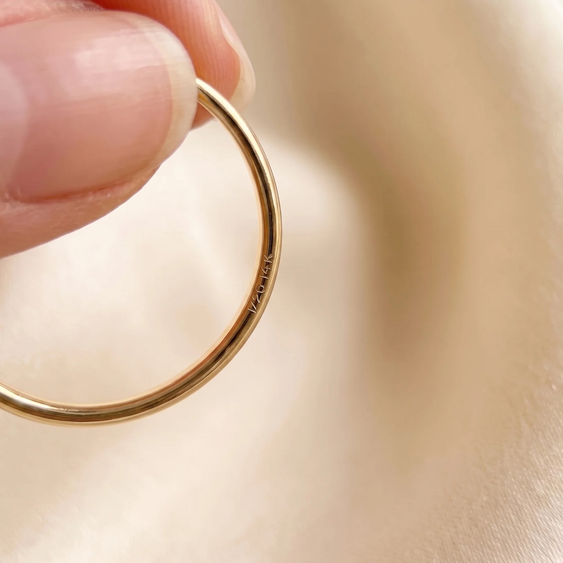 Dainty 14K gold filled stacking ring with three clear cubic zirconia stones