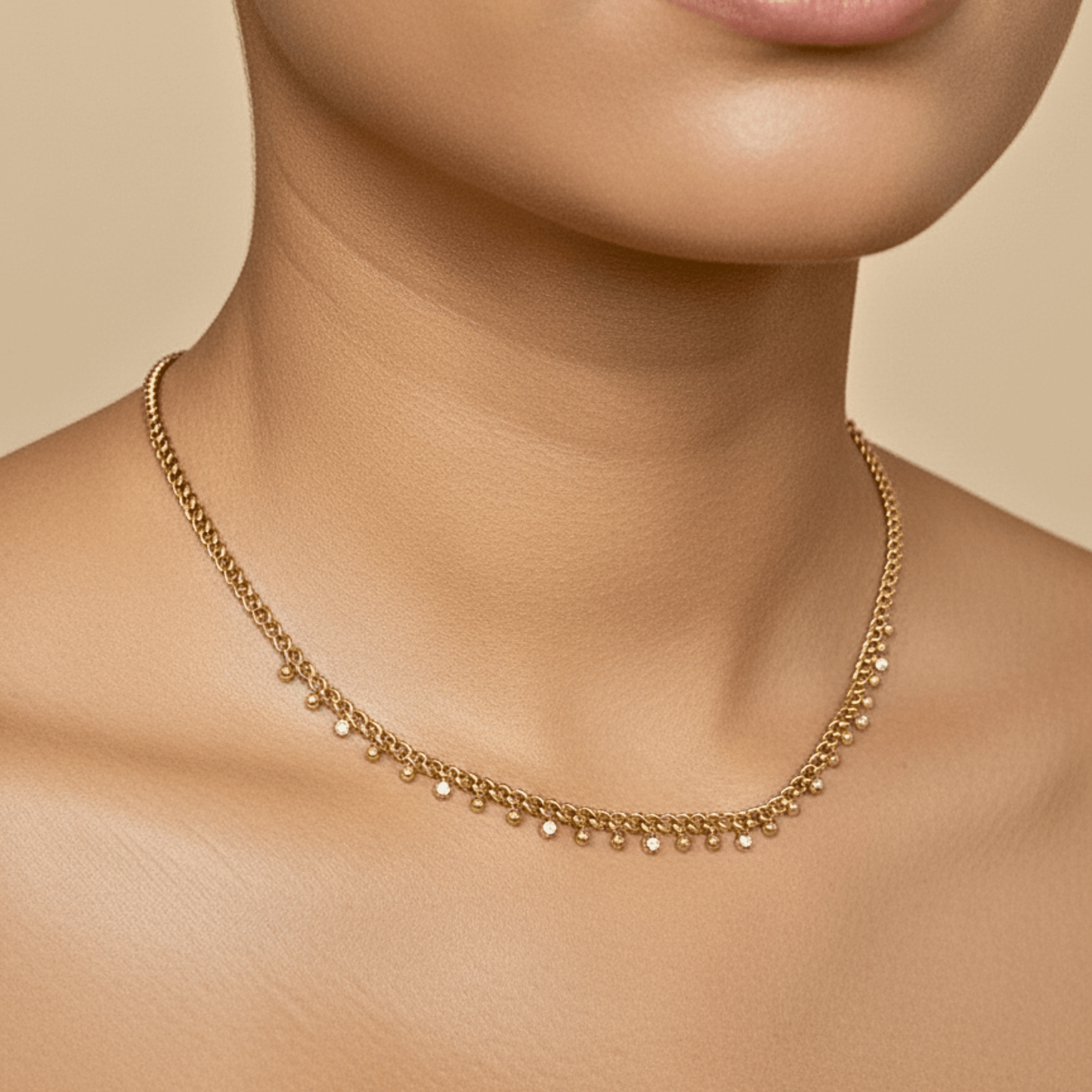 Elegant gold necklace featuring dotted zircon charms on a fine waterproof chain