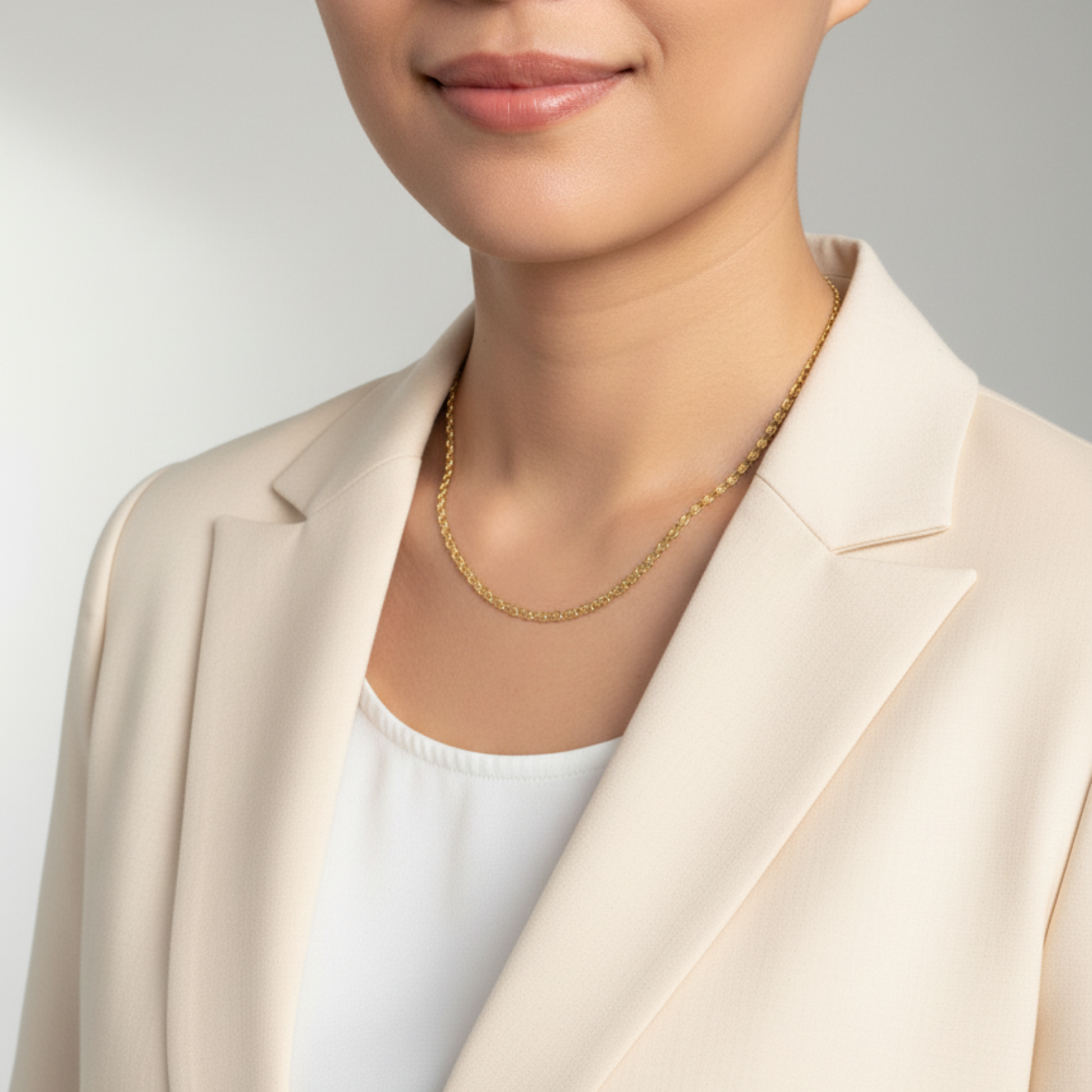 gold 3 mm dragon link chain necklace with interlocking links and polished finish on white background