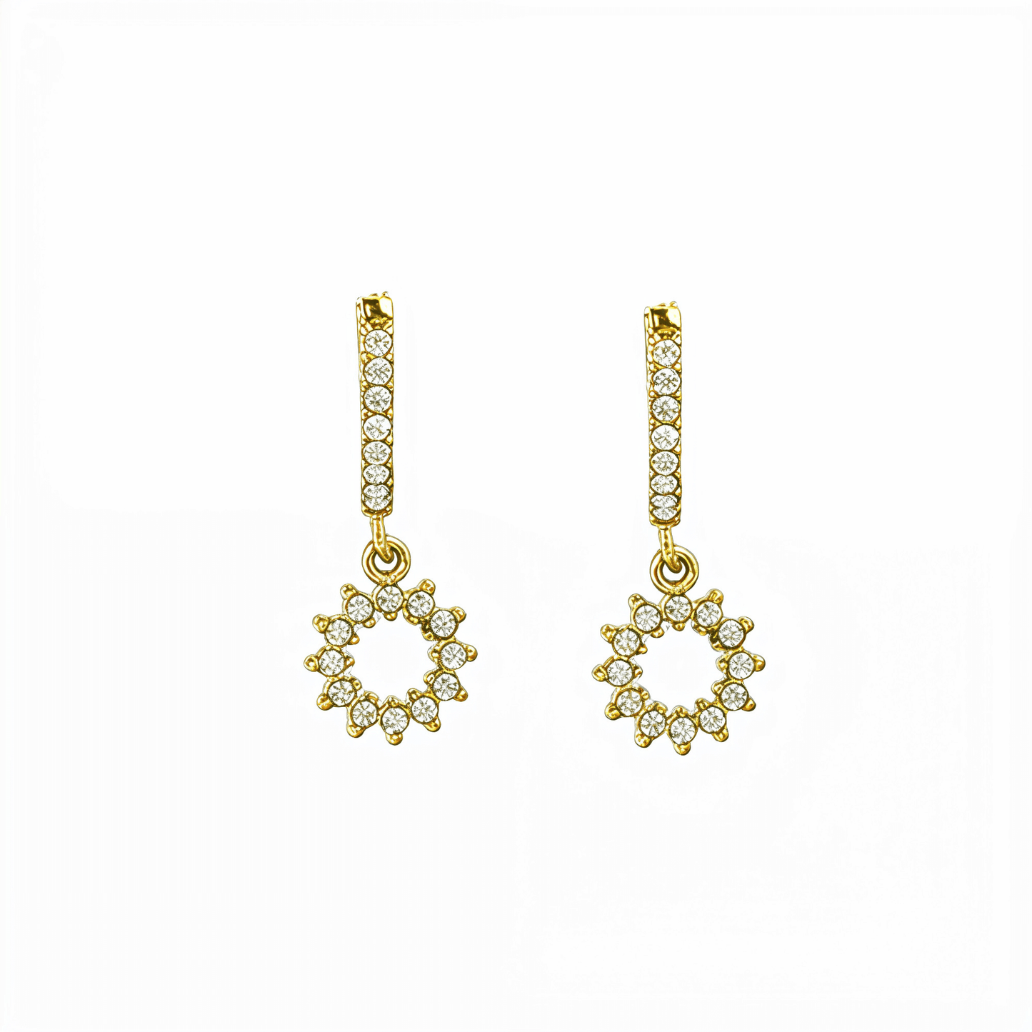 Gold huggie earrings featuring a pave crystal open circle charm dangling from a crystal hoop by MXW Jewellery